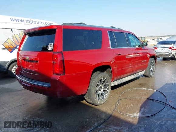 ✅ 2015 Chevrolet Suburban LTZ • VIN: 1GNSKKKC3FR287870 • Lot: 43361365. Listed on IAAI with 190,310 mi. Free auction sales archive from the USA and detailed vehicle history report at DreamBid. Image 4.