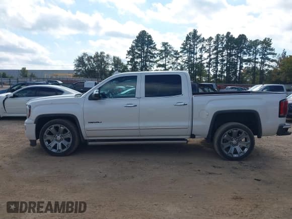 ✅ 2018 GMC Sierra 1500 Denali • VIN: 3GTU2PEJ6JG369769 • Лот: 43659971. Опубликован ранее на IAAI с пробегом 143 939 миль. Бесплатный доступ к архиву аукционных продаж из США и подробный отчёт об истории автомобиля на DreamBid. Изображение 14.