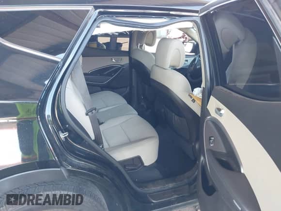 2018 Hyundai Santa Fe 2.4L z VIN 5NMZU3LB8JH066582, wystawiony jako IAAI lot #43283643 z przebiegiem 117 648 mil mil oraz . Historia ofert i sprzedaży dostępna na DreamBid. Obrazek 8.