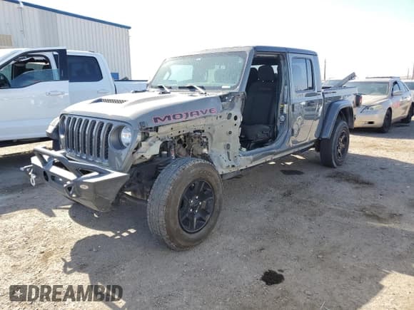 ✅ 2021 Jeep Gladiator Mojave • VIN: 1C6JJTEG4ML587372 • Lot: 56418025. Listed on Copart with 91,121 mi. Free auction sales archive from the USA and detailed vehicle history report at DreamBid. Image 1.