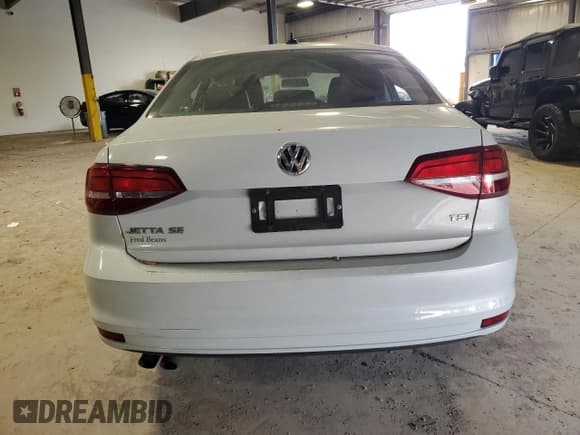 ✅ 2017 Volkswagen Jetta SE • VIN: 3VWB67AJ8HM312029 • Lot: 80785875. Listed on Copart with 123,072 mi. Free auction sales archive from the USA and detailed vehicle history report at DreamBid. Image 6.