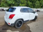 ✅ 2022 Chevrolet Trax LT • VIN: KL7CJLSM9NB560989 • Lot: 81088835. Listed on Copart with 64,218 mi. Free auction sales archive from the USA and detailed vehicle history report at DreamBid. Image 3.