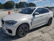 ✅ 2017 BMW X6 M • VIN: 5YMKW8C5XH0R43965 • Lot: 67785395. Wystawiony na Copart z przebiegiem 63 953 mil. Bezpłatny archiwum sprzedaży aukcyjnych z USA i szczegółowy raport historii pojazdu na DreamBid. Zdjęcie 1.