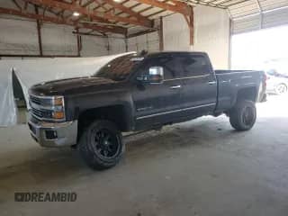 2015 Chevrolet Silverado 2500HD LTZ с VIN 1GC1KWE88FF631410, выставлен на аукционе Copart как лот 65878395 с пробегом 118 963 миль миль и Списание • Salvage title. История ставок и продаж доступна на DreamBid. Изображение 1.