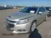 2016 Chevrolet Malibu LTZ z VIN 1G11E5SAXGF105153, wystawiony jako IAAI lot #43159960 z przebiegiem 145 269 mil mil oraz . Historia ofert i sprzedaży dostępna na DreamBid. Obrazek 2.