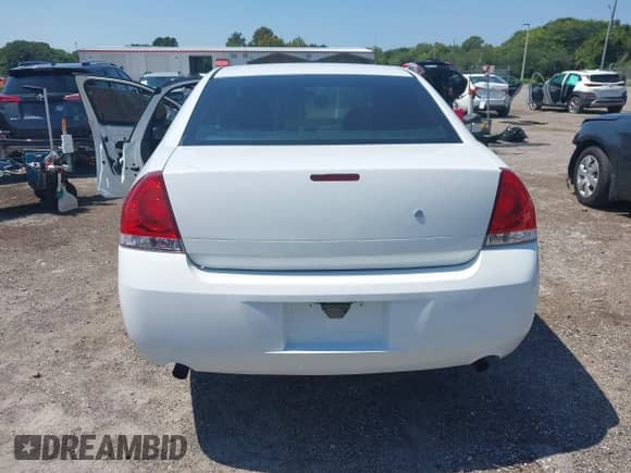 ✅ 2013 Chevrolet Impala Police • VIN: 2G1WD5E35D1221501 • Lot: 43269727. Listed on IAAI with 95,859 mi. Free auction sales archive from the USA and detailed vehicle history report at DreamBid. Image 16.