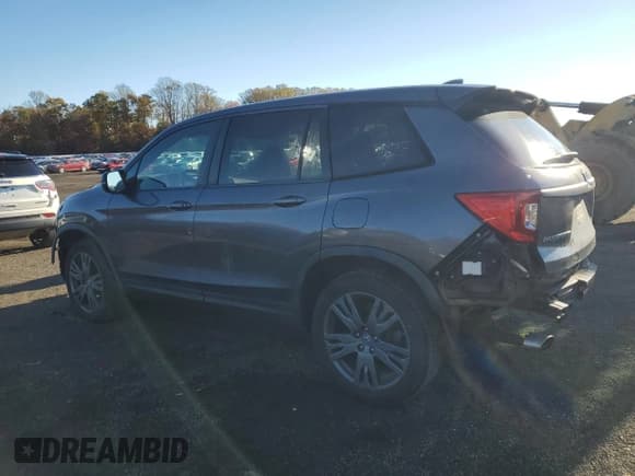 ✅ 2019 Honda Passport EX-L • VIN: 5FNYF8H57KB022131 • Lot: 90617565. Listed on Copart with 76,481 mi. Free auction sales archive from the USA and detailed vehicle history report at DreamBid. Image 2.