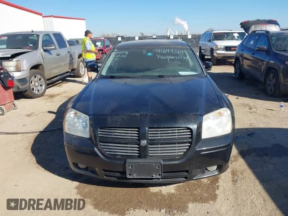 2005 Dodge Magnum SE с VIN 2D4FV48V55H661046, выставлен на аукционе IAAI как лот 41644364 с пробегом 125 400 миль миль и . История ставок и продаж доступна на DreamBid. Изображение 12.