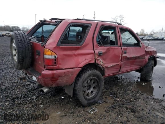 ✅ 1998 Isuzu Rodeo S • VIN: 4S2CM58W5W4350575 • Lot: 84537714. Wystawiony na Copart z przebiegiem 215 573 mil. Bezpłatny archiwum sprzedaży aukcyjnych z USA i szczegółowy raport historii pojazdu na DreamBid. Zdjęcie 3.