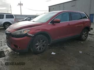 ✅ 2013 Mazda CX-9 Touring • VIN: JM3TB2CA8D0412610 • Lot: 82228785. Listed on Copart with 275,293 mi. Free auction sales archive from the USA and detailed vehicle history report at DreamBid. Image 1.