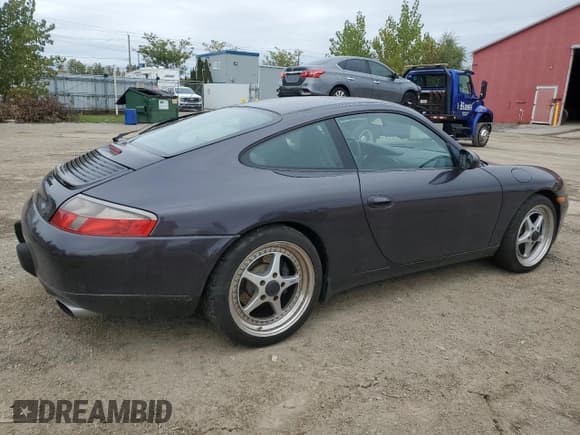 ✅ 1999 Porsche 911 • VIN: WP0AA2994XS623540 • Lot: 87206115. Wystawiony na Copart z przebiegiem 113 917 mil. Bezpłatny archiwum sprzedaży aukcyjnych z USA i szczegółowy raport historii pojazdu na DreamBid. Zdjęcie 3.