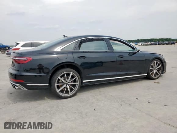 ✅ 2023 Audi S8 • VIN: WAULSAF81PN002747 • Lot: 57333525. Listed on Copart with 61,713 mi. Free auction sales archive from the USA and detailed vehicle history report at DreamBid. Image 3.