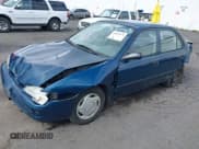 ✅ 1999 Toyota Corolla VE • VIN: 1NXBR12E7XZ192769 • Lot: 41825479. Listed on IAAI with 143,378 mi. Free auction sales archive from the USA and detailed vehicle history report at DreamBid. Image 2.