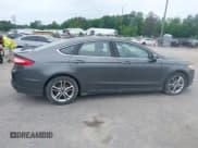 ✅ 2015 Ford Fusion Titanium Hybrid • VIN: 3FA6P0RU0FR117779 • Lot: 42365712. Listed on IAAI with 179,384 mi. Free auction sales archive from the USA and detailed vehicle history report at DreamBid. Image 13.