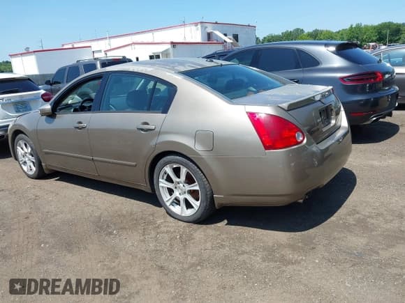 ✅ 2005 Nissan Maxima SE • VIN: 1N4BA41EX5C832190 • Lot: 42552195. Listed on IAAI with 100,652 mi. Free auction sales archive from the USA and detailed vehicle history report at DreamBid. Image 3.