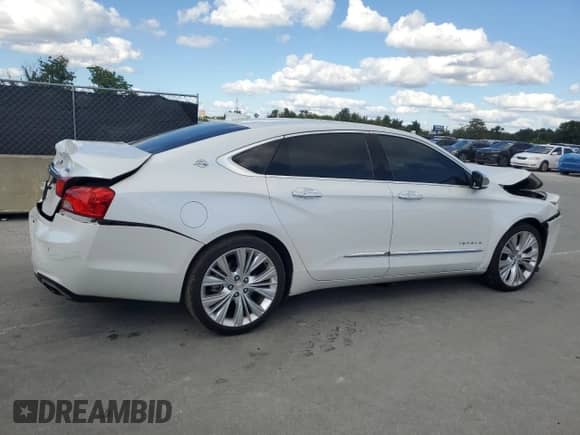 2017 Chevrolet Impala Premier z VIN 2G1145S32H9145788, wystawiony jako Copart lot #87188465 z przebiegiem 77 672 mil mil oraz Szkoda całkowita • Salvage title. Historia ofert i sprzedaży dostępna na DreamBid. Obrazek 3.