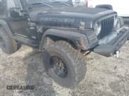 ✅ 1999 Jeep Wrangler Sport • VIN: 1J4FY19S5XP482862 • Лот: 43733183. Опубликован ранее на IAAI с пробегом 194 664 миль. Бесплатный доступ к архиву аукционных продаж из США и подробный отчёт об истории автомобиля на DreamBid. Изображение 6.