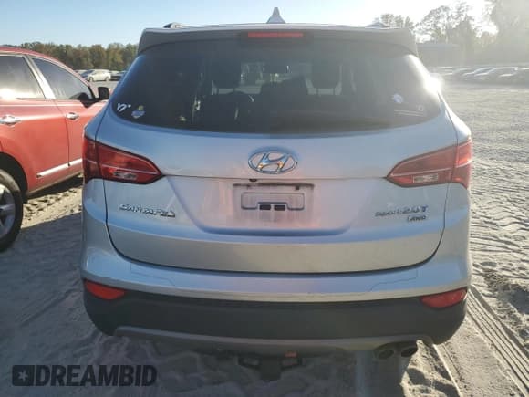 ✅ 2015 Hyundai Santa Fe Limited • VIN: 5XYZUDLAXFG288779 • Lot: 76032854. Listed on Copart with 118,358 mi. Free auction sales archive from the USA and detailed vehicle history report at DreamBid. Image 6.