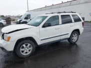 ✅ 2008 Jeep Grand Cherokee Laredo • VIN: 1J8GR48KX8C164165 • Lot: 41920548. Listed on IAAI with 215,545 mi. Free auction sales archive from the USA and detailed vehicle history report at DreamBid. Image 2.