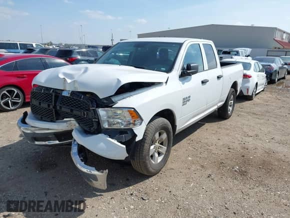 2024 Ram 1500 SLT with VIN 1C6RR6GG3RS128728, listed as a IAAI auction lot 41598041 with 24,872 mi miles and . Bid and sale history available at DreamBid. Image 2.
