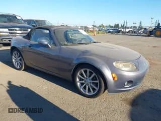 ✅ 2006 Mazda MX-5 Miata Sport • VIN: JM1NC25F960102251 • Lot: 42922515. Listed on IAAI with 146,038 mi. Free auction sales archive from the USA and detailed vehicle history report at DreamBid. Image 1.