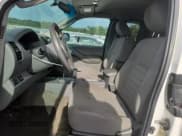 ✅ 2010 Nissan Frontier XE • VIN: 1N6BD0CT4AC405942 • Lot: 60354525. Listed on Copart with 215,386 mi. Free auction sales archive from the USA and detailed vehicle history report at DreamBid. Image 7.