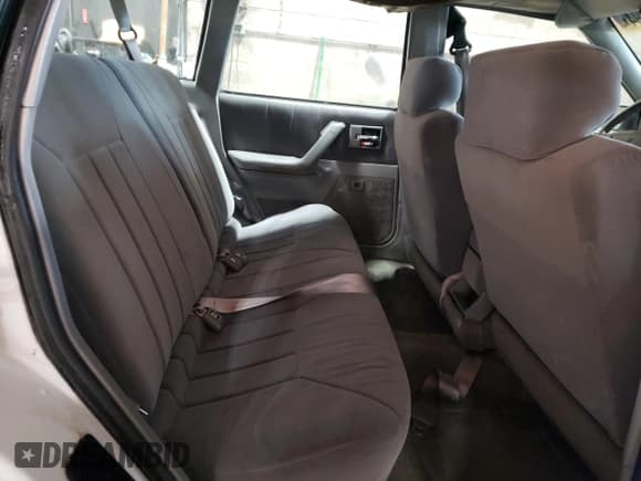 ✅ 1996 Oldsmobile Cutlass Ciera SL • VIN: 1G3AJ85M4T6309287 • Лот: 83699894. Опубликован ранее на Copart с пробегом 94 876 миль. Бесплатный доступ к архиву аукционных продаж из США и подробный отчёт об истории автомобиля на DreamBid. Изображение 10.