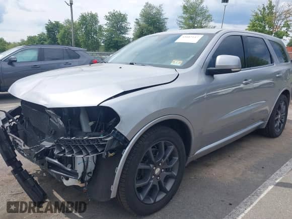 2017 Dodge Durango R/T with VIN 1C4SDJCT4HC606761, listed as a IAAI auction lot 43107117 with 87,878 mi miles and . Bid and sale history available at DreamBid. Image 2.