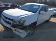 ✅ 2020 Chevrolet Colorado 2WD LT • VIN: 1GCHSCEA7L1166126 • Лот: 41374676. Опубликован ранее на IAAI с пробегом 113 623 миль. Бесплатный доступ к архиву аукционных продаж из США и подробный отчёт об истории автомобиля на DreamBid. Изображение 2.