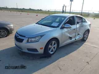 2014 Chevrolet Cruze 2LT with VIN 1G1PE5SB1E7372384, listed as a IAAI auction lot 43048716 with 153,863 mi miles and . Bid and sale history available at DreamBid. Image 2.