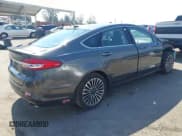 ✅ 2018 Ford Fusion Titanium • VIN: 3FA6P0SU7JR191820 • Lot: 42894692. Listed on IAAI with 40,542 mi. Free auction sales archive from the USA and detailed vehicle history report at DreamBid. Image 4.