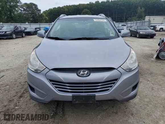 2011 Hyundai Tucson GLS z VIN KM8JU3AC1BU275337, wystawiony jako Copart lot #72953794 z przebiegiem 255 917 mil mil oraz Szkoda całkowita • Salvage title. Historia ofert i sprzedaży dostępna na DreamBid. Obrazek 5.
