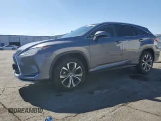 ✅ 2021 Lexus RX 350L • VIN: JTJHZKFA0M2028148 • Лот: 81299425. Опубликован ранее на Copart с пробегом 61 709 миль. Бесплатный доступ к архиву аукционных продаж из США и подробный отчёт об истории автомобиля на DreamBid. Изображение 1.