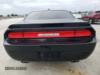 2012 Dodge Challenger SXT z VIN 2C3CDYAG7CH124959, wystawiony jako Copart lot #70822264 z przebiegiem 184 413 mil mil oraz Czysty tytuł • Clean title. Historia ofert i sprzedaży dostępna na DreamBid. Obrazek 6.