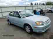 2004 Hyundai Accent GL z VIN KMHCG45C94U574027, wystawiony jako Copart lot #57463905 z przebiegiem 139 595 mil mil oraz Szkoda całkowita • Salvage title. Historia ofert i sprzedaży dostępna na DreamBid. Obrazek 14.