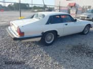 ✅ 1990 Jaguar XJS • VIN: SAJNW5840LC171313 • Лот: 43702249. Опубликован ранее на IAAI с пробегом 110 695 миль. Бесплатный доступ к архиву аукционных продаж из США и подробный отчёт об истории автомобиля на DreamBid. Изображение 4.