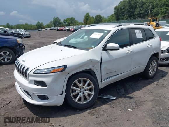 ✅ 2016 Jeep Cherokee Overland • VIN: 1C4PJMJS0GW343918 • Lot: 42682012. Listed on IAAI with 124,930 mi. Free auction sales archive from the USA and detailed vehicle history report at DreamBid. Image 2.