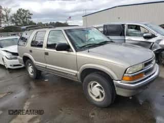 2001 Chevrolet Blazer LT z VIN 1GNDT13W912202072, wystawiony jako Copart lot #78792934 z przebiegiem 199 690 mil mil oraz Szkoda całkowita • Salvage title. Historia ofert i sprzedaży dostępna na DreamBid. Obrazek 4.