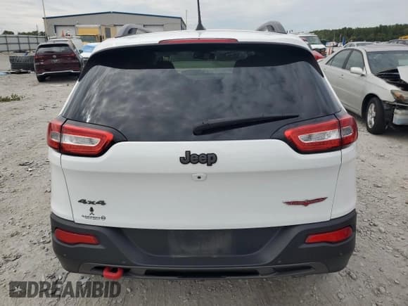✅ 2017 Jeep Cherokee Trailhawk L Plus • VIN: 1C4PJMBSXHD217450 • Лот: 80142225. Опубликован ранее на Copart с пробегом 114 053 миль. Бесплатный доступ к архиву аукционных продаж из США и подробный отчёт об истории автомобиля на DreamBid. Изображение 6.