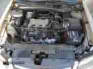 2003 Chevrolet Malibu LS z VIN 1G1NE52J03M720575, wystawiony jako Copart lot #76006164 z przebiegiem 126 282 mil mil oraz Szkoda całkowita • Salvage title. Historia ofert i sprzedaży dostępna na DreamBid. Obrazek 11.