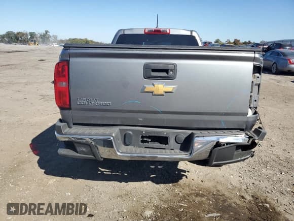 ✅ 2018 Chevrolet Colorado 4WD Work Truck • VIN: 1GCHTBEA5J1116510 • Лот: 75718634. Опубликован ранее на Copart с пробегом 26 419 миль. Бесплатный доступ к архиву аукционных продаж из США и подробный отчёт об истории автомобиля на DreamBid. Изображение 6.