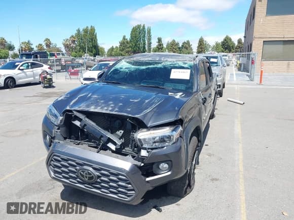 ✅ 2023 Toyota Tacoma SR5 • VIN: 3TMDZ5BN5PM154398 • Lot: 42784865. Listed on IAAI with 45,490 mi. Free auction sales archive from the USA and detailed vehicle history report at DreamBid. Image 6.