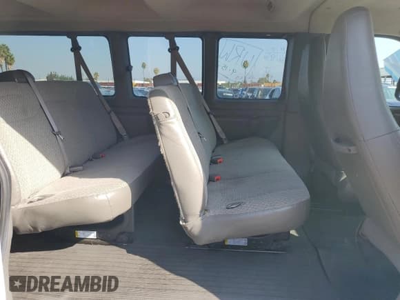 ✅ 2023 Chevrolet Express Passenger LS • VIN: 1GAZGNFP3P1234182 • Lot: 90387125. Listed on Copart with 36,837 mi. Free auction sales archive from the USA and detailed vehicle history report at DreamBid. Image 11.
