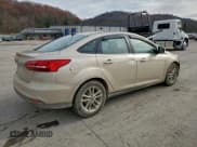 ✅ 2017 Ford Focus SE • VIN: 1FADP3F26HL317899 • Lot: 94105135. Wystawiony na Copart z przebiegiem 128 395 mil. Bezpłatny archiwum sprzedaży aukcyjnych z USA i szczegółowy raport historii pojazdu na DreamBid. Zdjęcie 3.