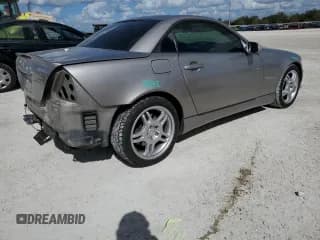 ✅ 2004 Mercedes-Benz SLK 3.2L AMG • VIN: WDBKK66F44F305309 • Лот: 79028614. Опубликован ранее на Copart с пробегом 87 884 миль. Бесплатный доступ к архиву аукционных продаж из США и подробный отчёт об истории автомобиля на DreamBid. Изображение 3.