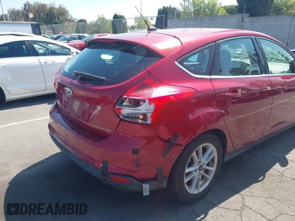 ✅ 2014 Ford Focus Titanium • VIN: 1FADP3N24EL158443 • Lot: 42801477. Listed on IAAI with 116,859 mi. Free auction sales archive from the USA and detailed vehicle history report at DreamBid. Image 6.