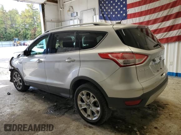 ✅ 2014 Ford Escape Titanium • VIN: 1FMCU9JX1EUA07956 • Лот: 85257465. Опубликован ранее на Copart с пробегом 77 203 миль. Бесплатный доступ к архиву аукционных продаж из США и подробный отчёт об истории автомобиля на DreamBid. Изображение 2.