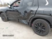 ✅ 2025 Mazda CX-50 S Premium • VIN: 7MMVABDM7SN334320 • Lot: 43597828. Listed on IAAI with 11,321 mi. Free auction sales archive from the USA and detailed vehicle history report at DreamBid. Image 6.