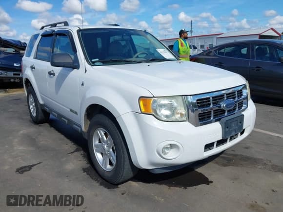 ✅ 2008 Ford Escape Hybrid • VIN: 1FMCU59H88KA49868 • Lot: 43119417. Listed on IAAI with 125,254 mi. Free auction sales archive from the USA and detailed vehicle history report at DreamBid. Image 1.