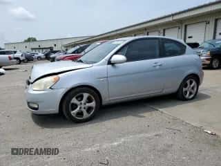 2007 Hyundai Accent SE with VIN KMHCN36CX7U038061, listed as a Copart auction lot 63790134 with 104,618 mi miles and Salvage title. Bid and sale history available at DreamBid. Image 1.